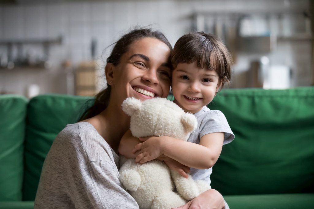 Mother and child hugging